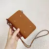 2025 Transfronteiriça Nova Couro Bovino de Primeira Camada Granulado Bolsa para Celular Moda Simples Multifuncional Bolsa para Celular de Pendurar no Pescoço Tendência