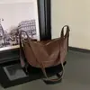 Bolso tipo dumpling retro de nicho transfronterizo para mujer, nueva colección otoño/invierno 2026, bolso de hombro de alta gama, bolso cruzado casual y apto para el trabajo