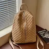Mochila casual transfronteriza de alta gama y gran capacidad, nueva colección otoño 2026, de nicho y a la moda, con patrón de diamantes, bolsa para el día a día y para viajar