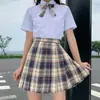Uniforme jk falda otoño básico conjunto completo de falda a cuadros camisa manga corta corbata de lazo conjunto completo de estilo universitario japonés