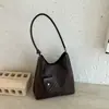 Bolsa de palha trançada transfronteiriça moderna de grande capacidade feminina, nova coleção de verão 2026, bolsa tote elegante de ombro único ou transversal