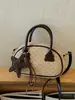 Bolso de Mano de Lunares Elegante de Diseño de Nicho para Mujer 2026 Nuevo Otoño/Invierno Versátil para Viajar Cruzado Pequeño Bolso Tote
