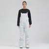Pantalones de esquí de invierno nuevos con correa para mujer, resistentes al viento, impermeables, cálidos, profesionales, de una sola tabla, para comercio exterior, para deportes al aire libre, pantalones de nieve