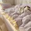 Juego de cuatro piezas de terciopelo con relieve estilo francés, funda de edredón cálida de doble cara de terciopelo de leche Clase A, sábana y juego de tres piezas de felpa para niñas