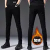 Jeans pretos de primavera e outono de Hong Kong para homens, calças skinny de corte justo, elásticas, calças compridas de negócios casuais de alta qualidade para homens de meia-idade