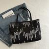 Bolso de mano informal de gran capacidad, a rayas, de moda, estilo nuevo de invierno 2025, elegante y fresco, para llevar al hombro o debajo del brazo, para mujer.