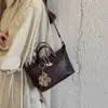 Bolso Cubo Vintage de Gama Alta Modelo Nuevo 2026 para Mujer, Bolso Cruzado Versátil de Gama Alta de Nicho, Bolso de Mano Versátil para el Día a Día
