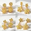 Aretes de flor dorada para mujer, aretes versátiles de moda de lujo ligero, diseño de nicho con un toque de alta gama, comercio exterior transfronterizo