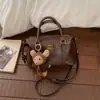 Bolsa Feminina de Alta Aparência Estilo Pillow Bag Inverno 2025 Nova Tendência Elegante para o Dia a Dia Bolsa de Ombro Transversal Bolsa de Mão Bolsa Boston