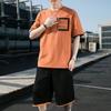 Traje de manga corta tipo gofre para hombre, nueva marca de moda de verano, un conjunto de guapos jóvenes estudiantes, traje deportivo de ocio