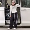 Conjunto de Roupa Outono 2026 para Meninas: Calça Estilosa de Manga Longa e Perna Larga, Roupa Estilo Coreano para Aluno do Ensino Fundamental, Conjunto de Calça Esportiva de Duas Peças