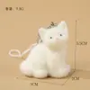 Chaveiro de Gato Branco de Pelúcia Macio e Fofo Desenho Animado Mini Pingente de Gato Charme para Bolsa Celular Pequeno Acessório