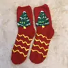 Calcetines de Navidad de coral de otoño e invierno, calcetines de suelo cálidos para el hogar de terciopelo medio, calcetines de Navidad de Papá Noel