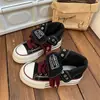 Zapatos de lona de caña alta para mujer, zapatos negros, nuevo modelo otoño 2026, zapatillas de estudiante para mujer, zapatos casuales versátiles y de moda