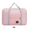 Nueva bolsa de almacenamiento de rendimiento de gran capacidad bolsa de almacenamiento para el hombro bolsa plegable portátil bolsa para avión bolsa de regalo al por mayor en stock