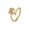 Distrito Lu Temu Más Vendido 26 Letras Inglesas Microincrustado Circonita Moda Anillo para Mujer Chapado en Cobre con 18K Anillo Abierto