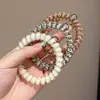 Goma para el pelo de alambre de teléfono con estampado de leopardo retro, alta elasticidad, banda de goma sin marcas para adultos, adecuada para coletas, simple y elegante, no daña el cabello