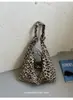 Bolso de mano nuevo estilo japonés con estampado de leopardo para mujer, bolso de hombro de lona versátil y moderno, bolso escolar casual para estudiante, moderno