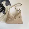Textura retro gran capacidad 2026 color sólido temperamento invierno nuevo elegante casual bolso de mano bandolera mujer