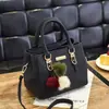 Bolsa Estilo Novo 2022 Moda Feminina Estilo Coreano Bolsa de Mão Casual Pequena Quadrada Bolsa Transversal de Ombro Feminina Primavera