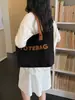 2026 Nuevo Bolso de Hombro Individual Retro con Letras para el Trabajo Gran Capacidad Estilo Bosque Artístico Popular Bolso Cruzado de Hombro Único