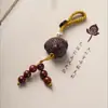 Talla antigua de palo de rosa indonesio accesorios de pez anual colgante de joyería cadena para teléfono móvil regalo boutique retro para hombres y mujeres