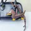 Venta Caliente Transfronteriza Colgante de Dachshund Creativo para Colgar en Bolsos Llavero de Coche de Perro Salchicha de Cuero PU Lindo Regalo