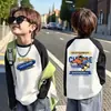 Camiseta de manga larga para niño de algodón puro con bloques de color, capa base para primavera/otoño, nuevo top raglán estampado elegante y versátil para niños