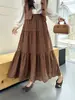 Saia jacquard bordada estilo francês de cintura alta, novo estilo verão 2026, elegante, modelagem solta, versátil, afina a silhueta, saia longa com barra ampla