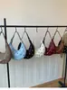 Bolso de Axila de Diseño de Nicho de Alta Gama para Mujer 2026 Nuevo Bolso de Hombro de Moda Estilo Caliente Bolso Cruzado Simple Bolso de Mujer