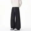 Pantalones deportivos modernos con costuras de cuadros de pana con estampado oscuro, pantalones rectos casuales, pantalones largos de talla grande nuevos de otoño 2026