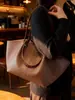 Bolsa Feminina de Grande Capacidade Transfronteiriça 2026 Nova Tendência Outono e Inverno Bolsa de Mão Retrô Bolsa de Ombro de Alto Padrão Bolsa Tote