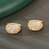 Nuevo diseño de hebilla de oreja redonda geométrica de cobre incrustado de circonio elegante europeo y americano Pendiente de aro brillante para mujer venta al por mayor de fábrica
