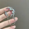 Accesorios Góticos Nuevos Europeos y Americanos Pendientes Punk de Dardos Borla de Metal Plateado Par Genial Pendientes para Mujer
