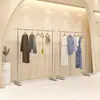 Tienda de ropa moderna simple soporte de exhibición especial de acero inoxidable para piso estante de exhibición de perchas para tienda de ropa de hombre y mujer