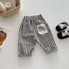 Pantalones Casuales Populares Lindos Estilo Coreano con Diseño de Bolsillo Trasero para Niños y Niñas, Cómodos Grandes de Polipropileno Ajuste Holgado Versátiles Pantalones para Bebé