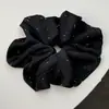 Anel de cabelo de intestino grosso de cetim com estrela de strass cor creme, temperamento de alto senso, corda de cabelo nova 2025 para rabo de cavalo, coque