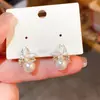 Pendientes de Flor Geométrica de Imitación Perla y Circonita Estilo Vintage de Aguja Plateada Lujo Ligero Personalidad de Moda Nicho Elegantes de Gama Alta para Mujeres