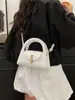 Bolsa de mão de nicho estilo coreano transfronteiriça para mulheres, novo modelo outono 2026, moda para o dia a dia, bolsa transversal de ombro vintage de alta aparência