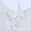 Nuevos pendientes de acrílico con puntadas de pétalos estilo bohemio, efecto onda de agua, pendientes de flor exagerados de moda