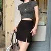 Falda corta negra de estilo retro americano 2024, de cintura alta para mujer primavera/verano, ajustada de línea A, sexy y versátil