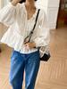 Camisa de Renda Feminina Outono 2026, Blusa Branca de Manga Longa com Design Francês Europeu e Americano, Top de Moda Feminina Transfronteiriço