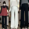 Moda Gestante 2026 outono e inverno calça de gestante que faz as pernas parecerem mais longas, calça longa de tricô versátil com fenda e alças ajustáveis