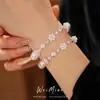 Pulsera de Perlas Redondas con Flor de Circonita, Gama Alta, Exquisita, Pulsera de Lujo Ligero, Estilo Palacio, Joyería de Mano Elegante al por Mayor