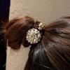 Tocado de cuerda para el cabello de alta gama con forma de anillo para mujer, estilo coreano, elegante, con perlas y bolas de goma para el cabello de celebridades de Internet.