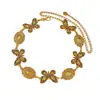 Cadena de cintura de metal mariposa bohemia transfronteriza europea y americana para mujer, cadena corporal de cinturón de cintura ovalado tallado estilo étnico vintage