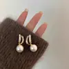 Pendientes de Perla de Concha para Mujer 2025 Nuevo Estilo Caliente Gama Alta Nicho Elegantes Populares Pendientes Personalizados