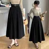 Elegante falda larga de algodón y lino, con dobladillo ancho, que cubre la cadera, estilo casual línea A, nuevo estilo otoño 2026, de cintura alta, falda midi plisada