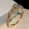 Pulseira Clássica de Ouro 18K com Microincrustação de Zircônia de Cobre Zircônia Dinheiro Leopardo Joias Acessórios Europeus e Americanos Transfronteiriços Pulseira de Cabeça de Leopardo
