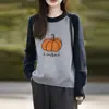 Tejido de punto jacquard de calabaza en color contrastante para mujer 2025 Nuevo color a juego Aspecto rejuvenecedor adelgazante Suéter holgado Ropa de punto cálida de base